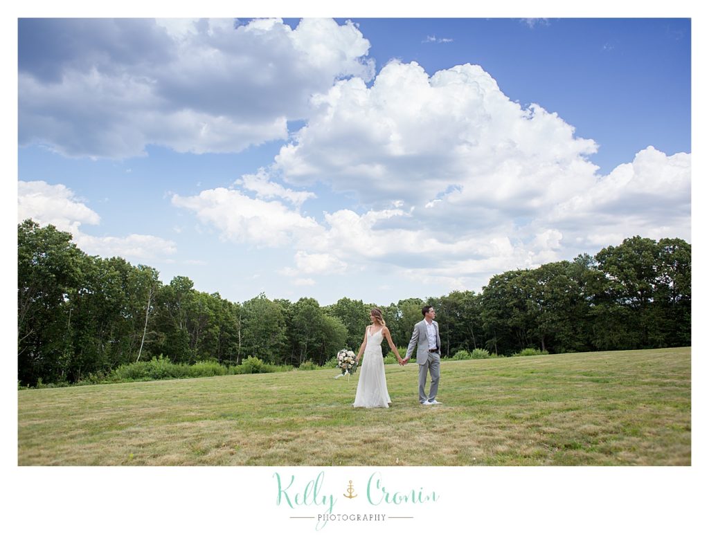 Newlyweds walk together | Kelly Cronin Photography | Cape Cod Wedding Photographer