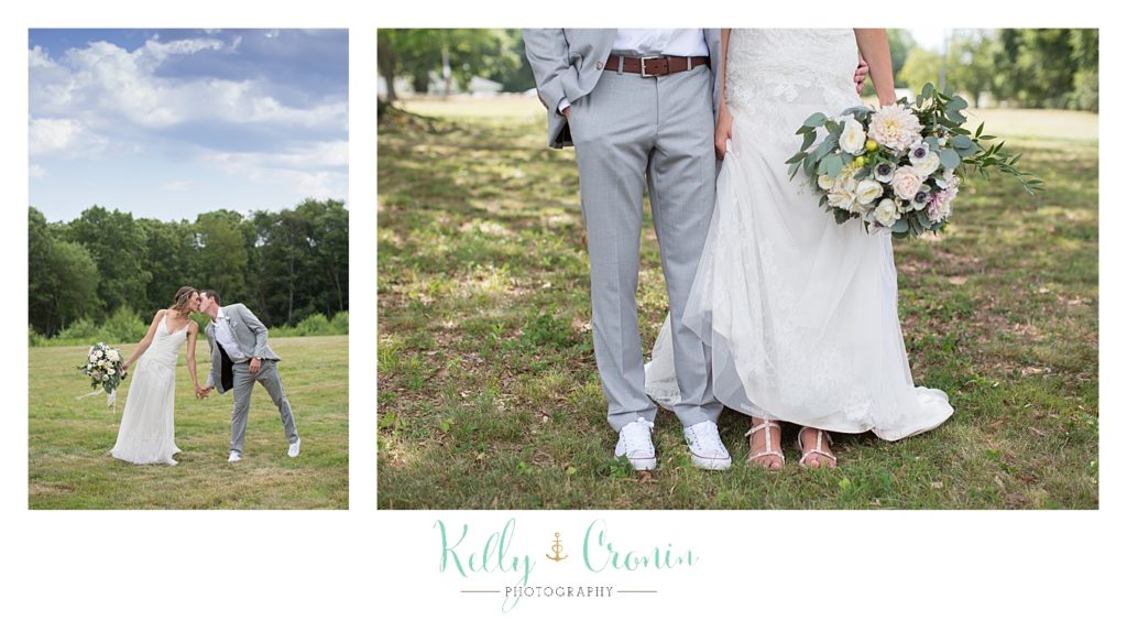 A man stands with his wife | Kelly Cronin Photography | Cape Cod Wedding Photographer
