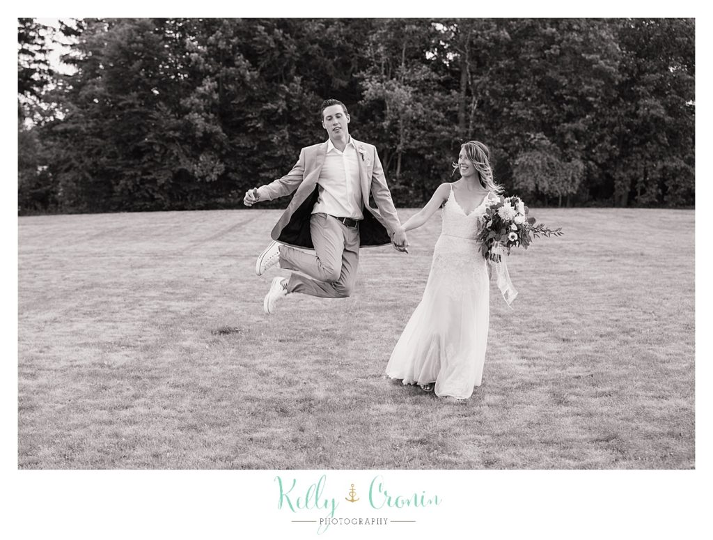 A man kicks his heels | Kelly Cronin Photography | Cape Cod Wedding Photographer