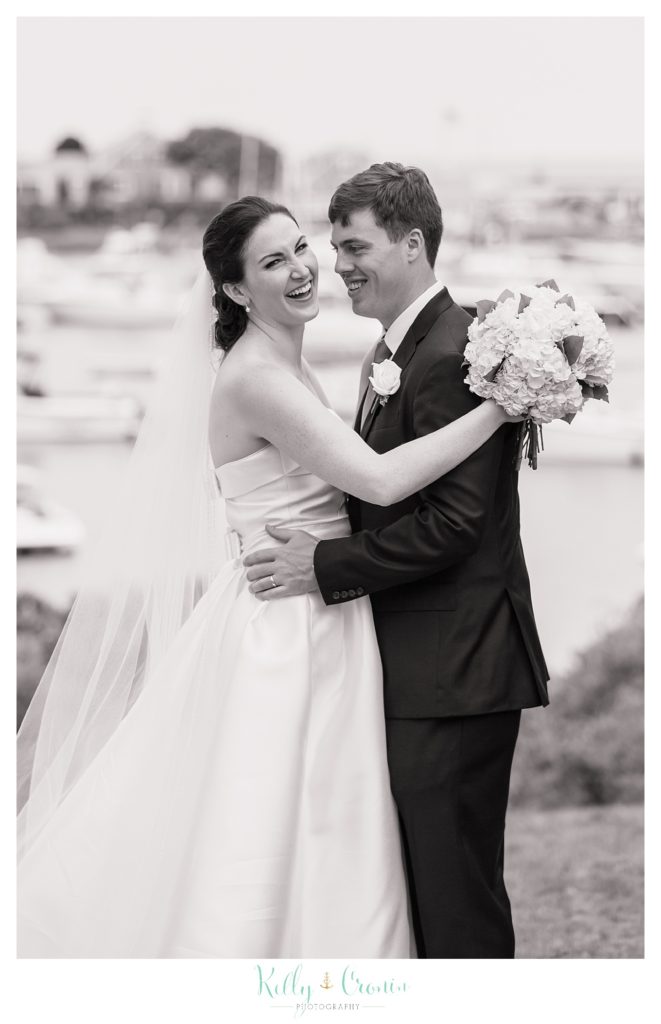 A bride laughs with her groom | Kelly Cronin Photography | Cape Cod Wedding Photographer