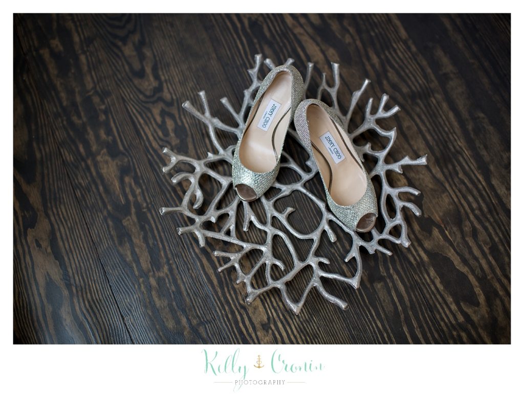 Bridal shoes sit on coral | Kelly Cronin Photography | Cape Cod Wedding Photographer