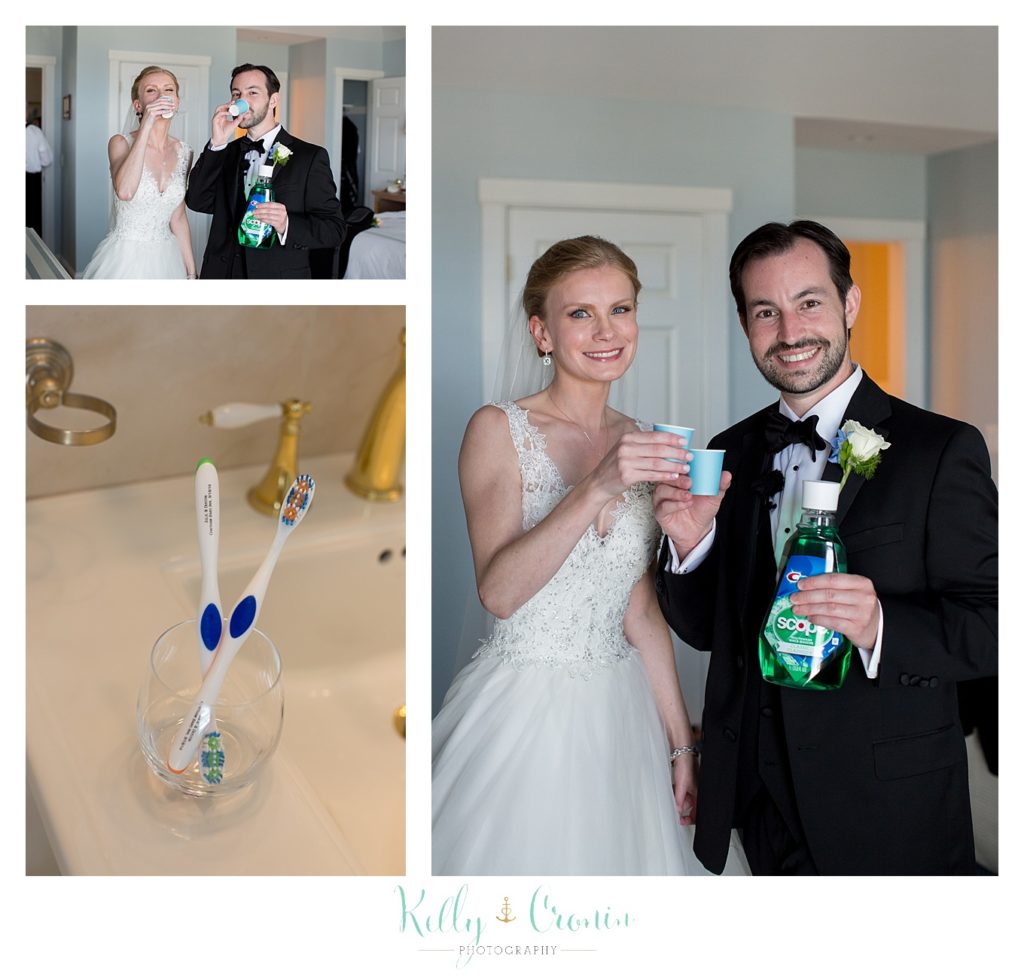 A bride and groom take a shot of mouthwash | Kelly Cronin Photography | Cape Cod Wedding Photographer