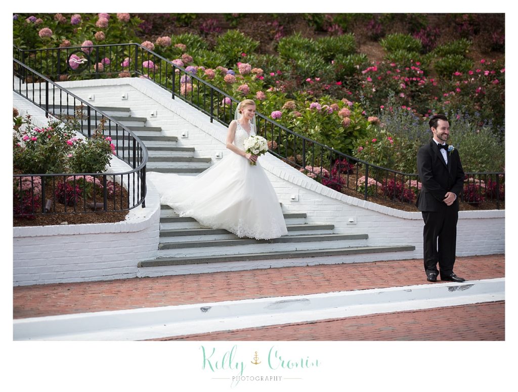 A bride walks down steps | Kelly Cronin Photography | Cape Cod Wedding Photographer