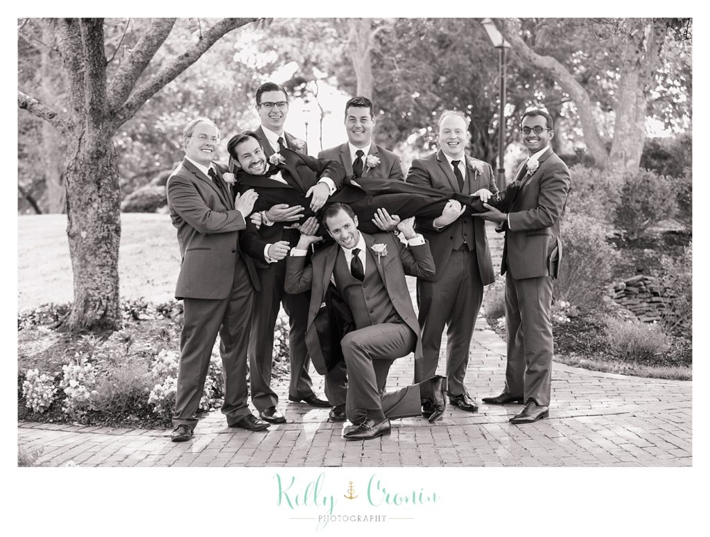 A groom acts silly | Kelly Cronin Photography | Cape Cod Wedding Photographer