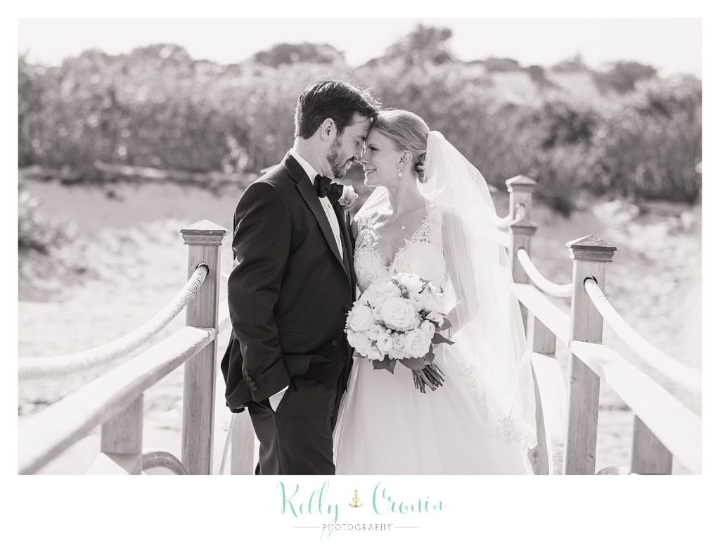 A groom kisses his bride | Kelly Cronin Photography | Cape Cod Wedding Photographer