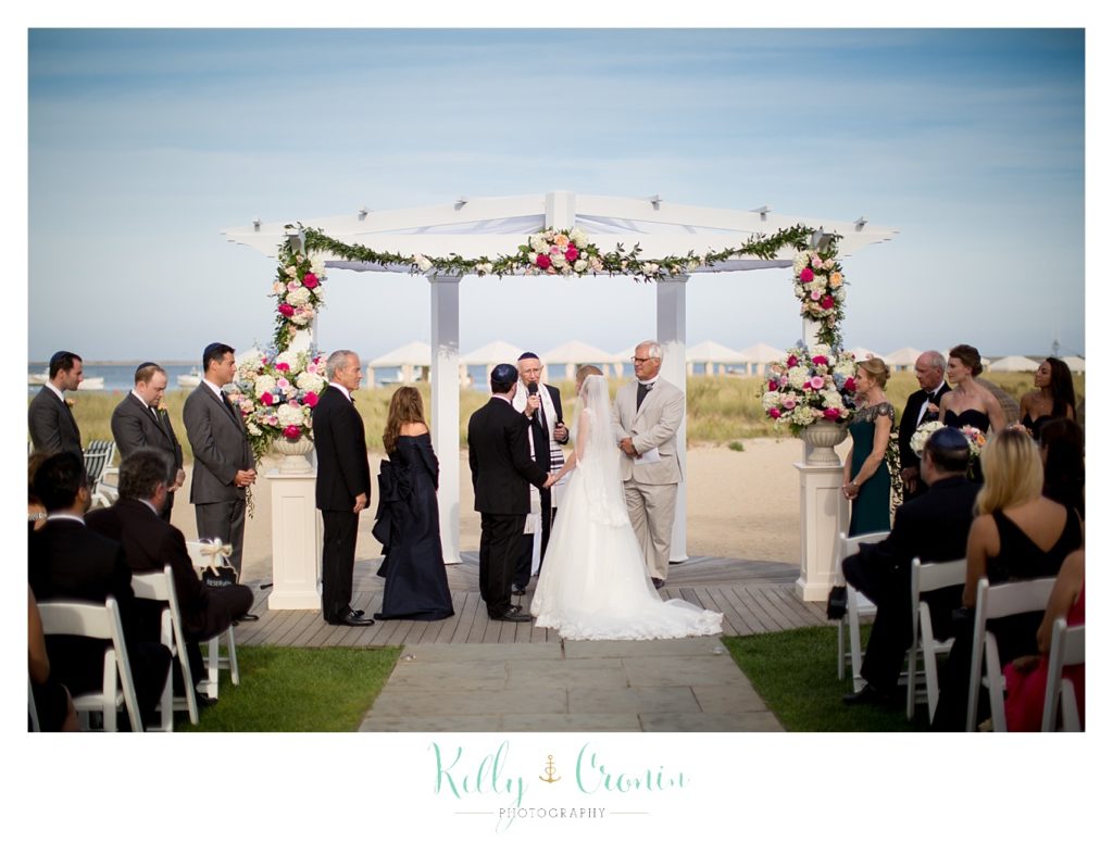 A couple exchange vows | Kelly Cronin Photography | Cape Cod Wedding Photographer