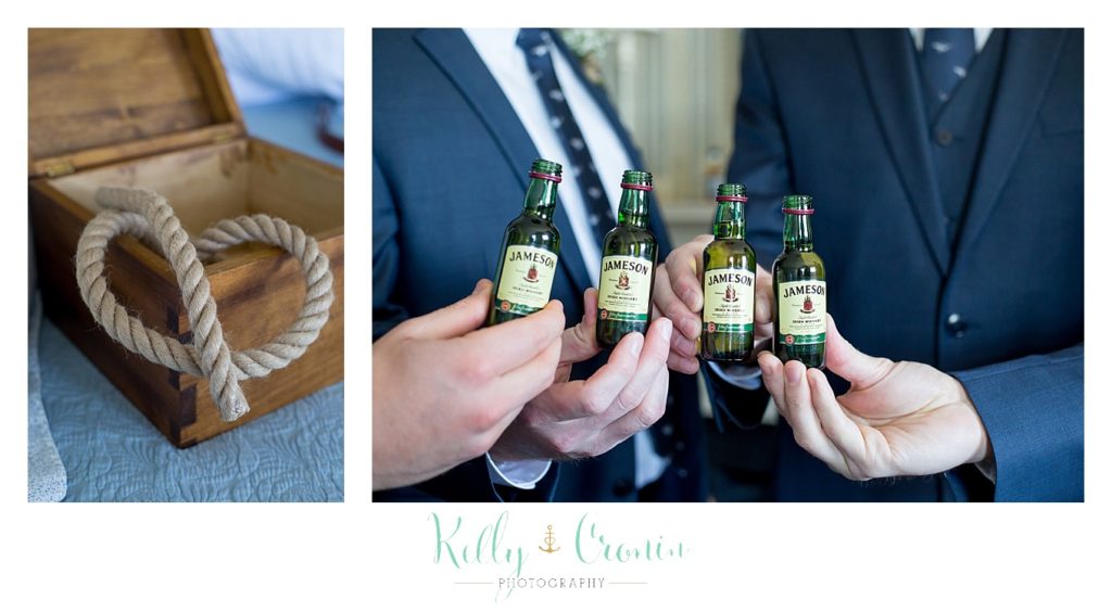 Men hold shots of whiskey | Kelly Cronin Photography | Cape Cod Wedding Photographer