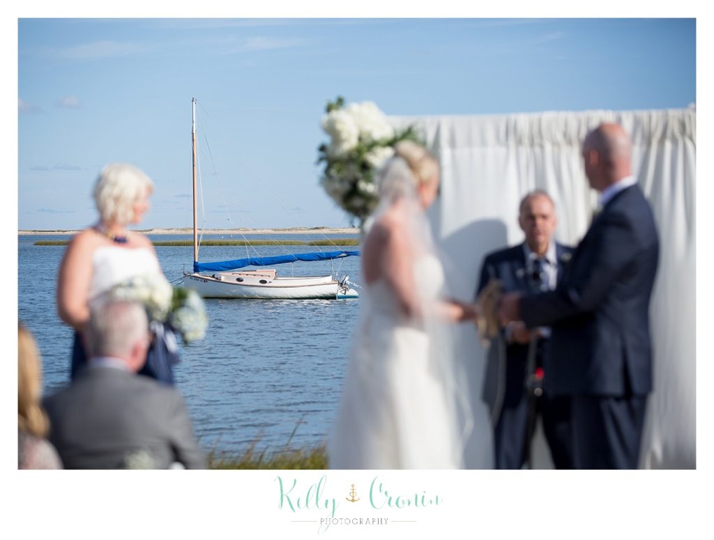 A couple exchanges vows | Kelly Cronin Photography | Cape Cod Wedding Photographer