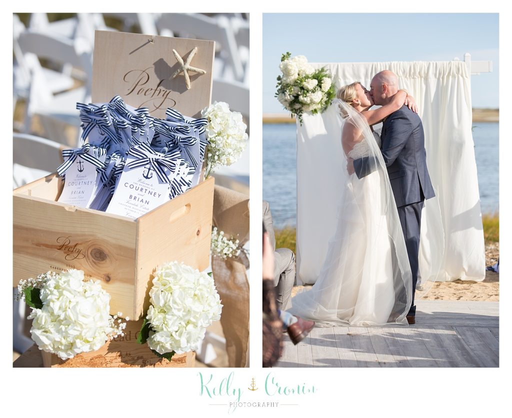 A couple enjoys their first kiss married | Kelly Cronin Photography | Cape Cod Wedding Photographer