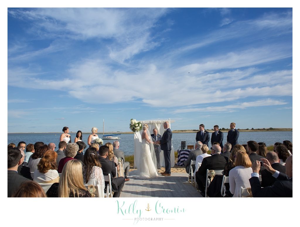 A couple echanges vows | Kelly Cronin Photography | Cape Cod Wedding Photographer
