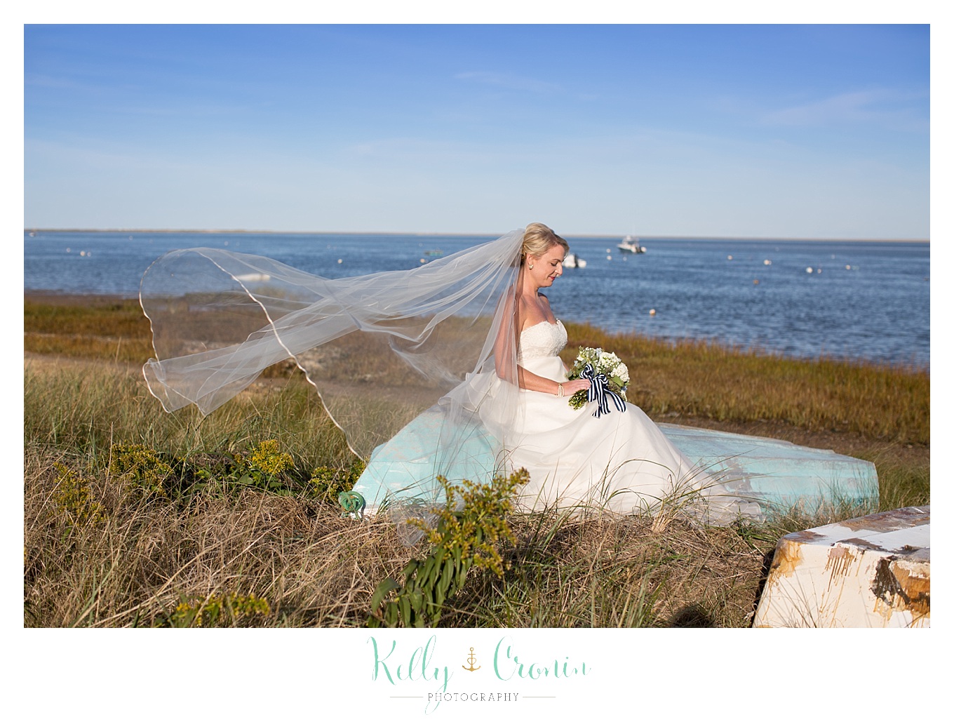A woman wears a wedding dress | Kelly Cronin Photography | Cape Cod Wedding Photographer