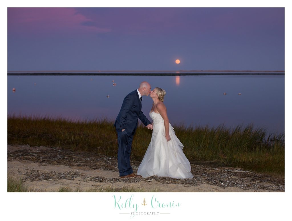 A couple kisses at sunset | Kelly Cronin Photography | Cape Cod Wedding Photographer