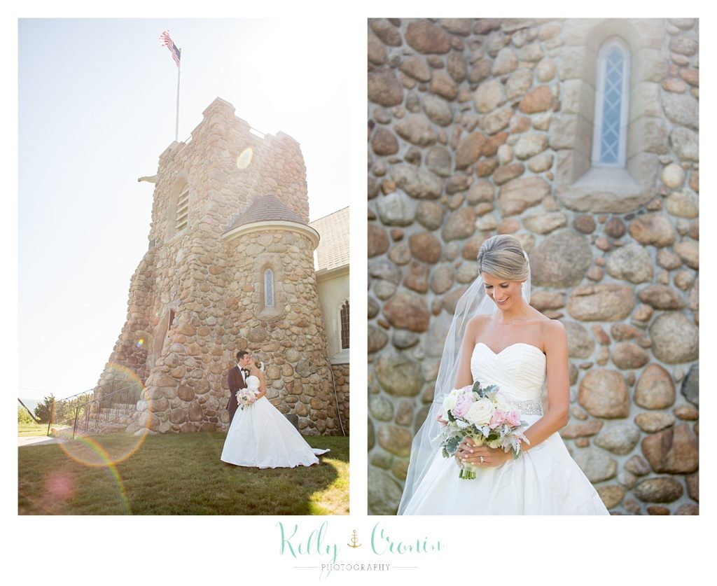 A married couple stand in front of a castle  | Kelly Cronin Photography | Cape Cod Wedding Photographer
