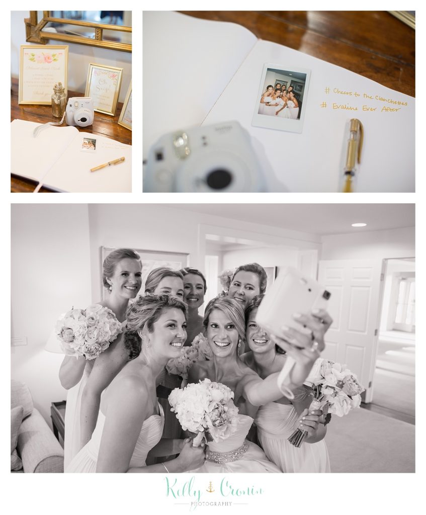 A bride celebrates with the bridal party  | Kelly Cronin Photography | Cape Cod Wedding Photographer