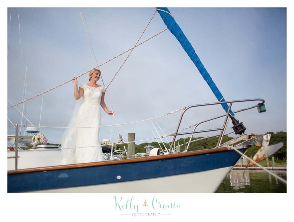 A bride sails  | Kelly Cronin Photography | Cape Cod Wedding Photographer