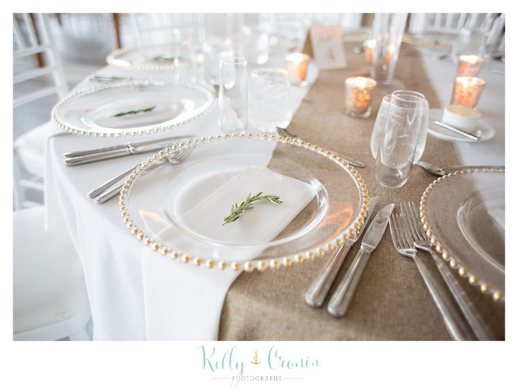 Plates are decorated with rosemary  | Kelly Cronin Photography | Cape Cod Wedding Photographer