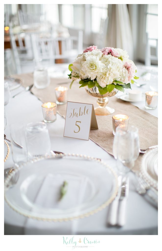A table is decorated for a wedding  | Kelly Cronin Photography | Cape Cod Wedding Photographer