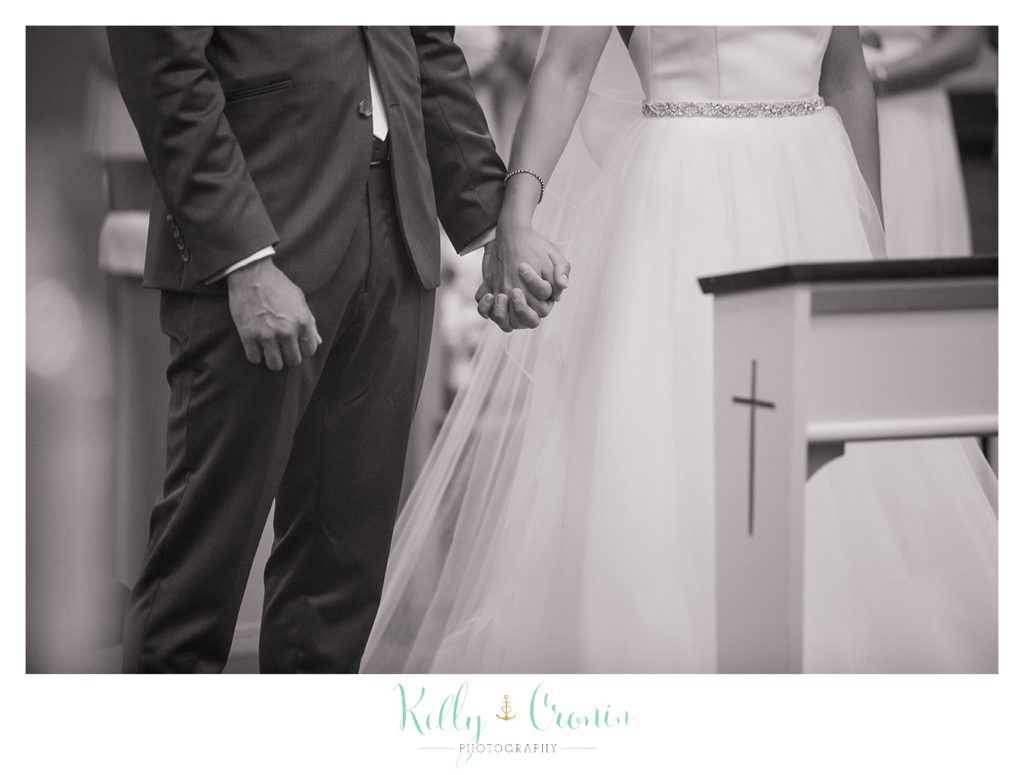 A couple holds hands | Kelly Cronin Photography | Cape Cod Wedding Photographer