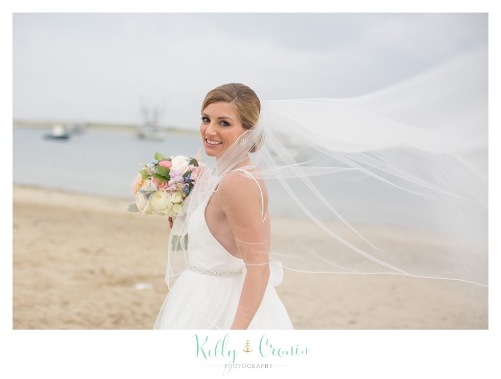 A bride's veil flows | Kelly Cronin Photography | Cape Cod Wedding Photographer
