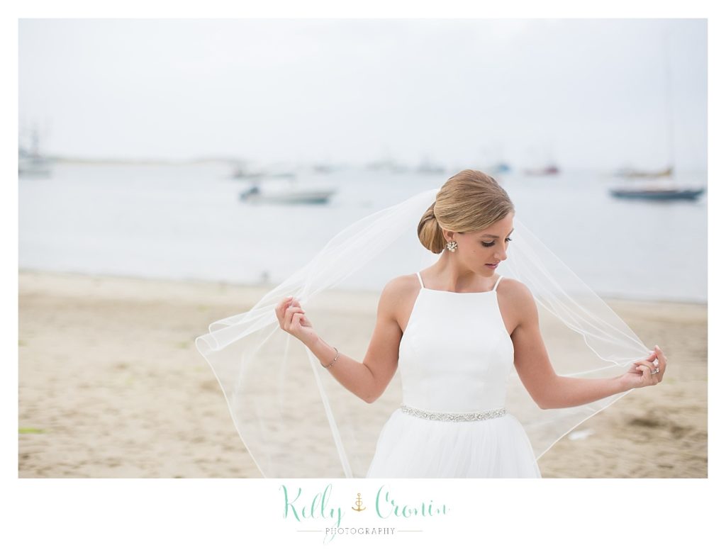 A bride dances on the beach | Kelly Cronin Photography | Cape Cod Wedding Photographer