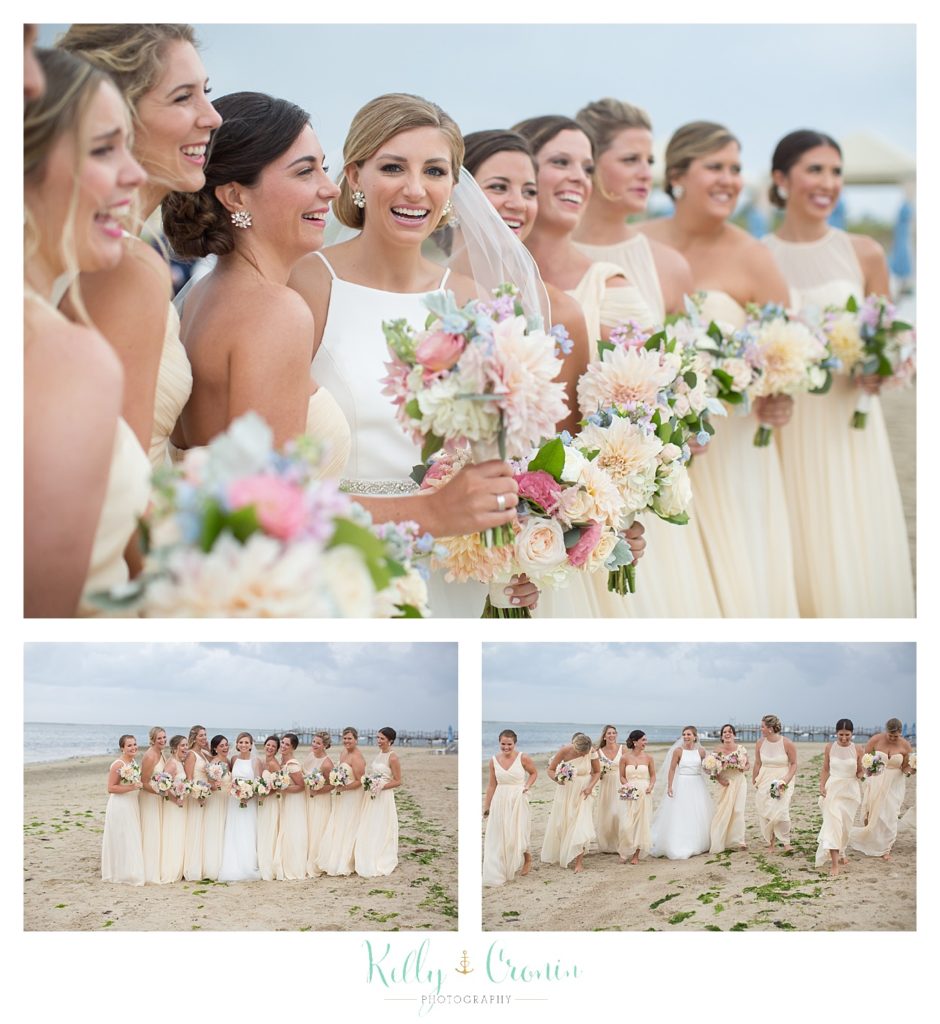A bridal party stands on the beach | Kelly Cronin Photography | Cape Cod Wedding Photographer