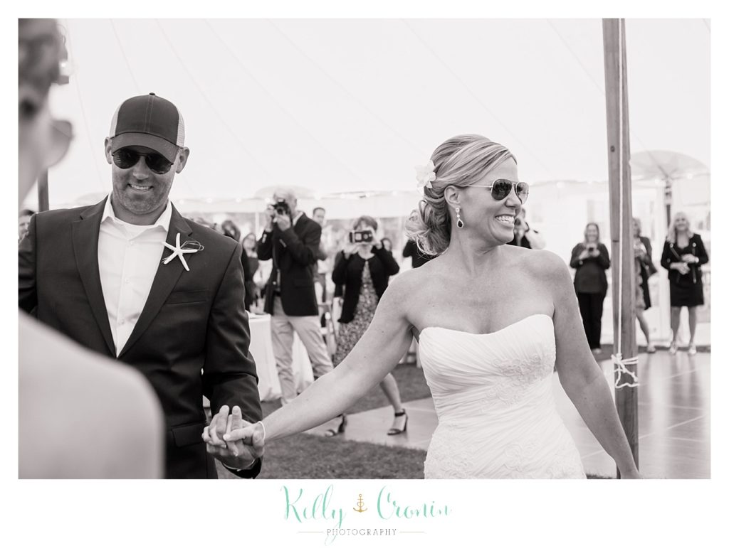 A couple holds hands | Kelly Cronin Photography | Cape Cod Wedding Photographer