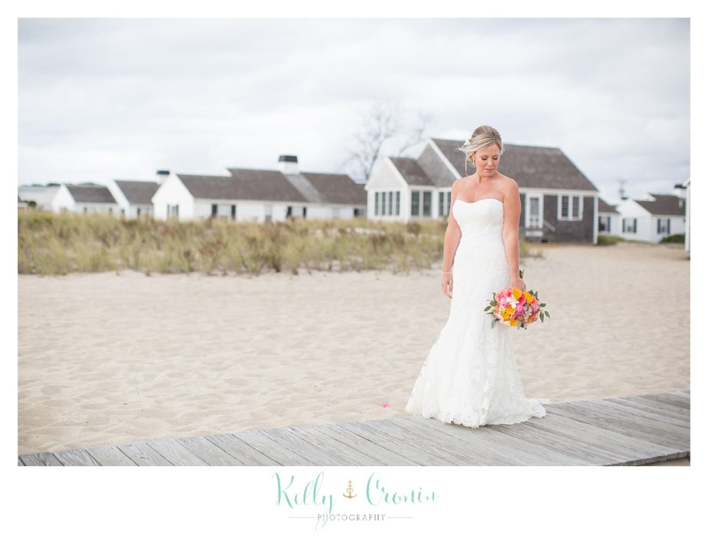 A bride stands by herself | Kelly Cronin Photography | Cape Cod Wedding Photographer