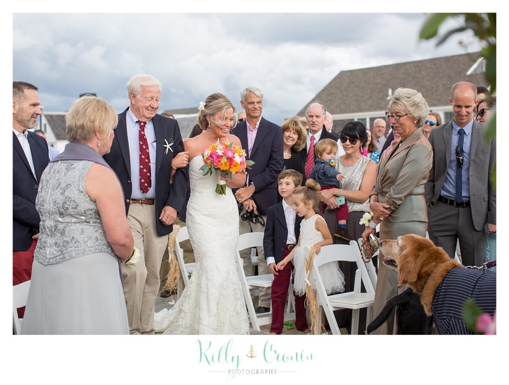 A man walks his daughter down the aisle | Kelly Cronin Photography | Cape Cod Wedding Photographer
