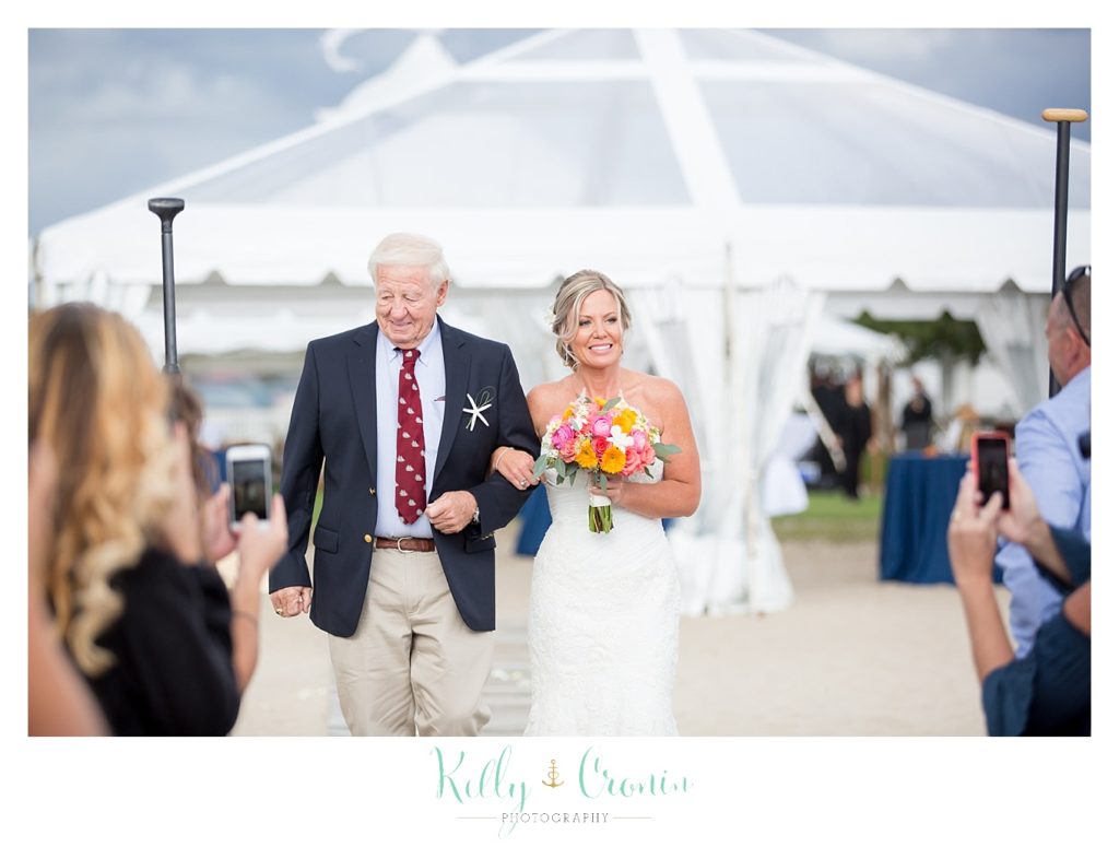 A bride walks with her dad | Kelly Cronin Photography | Cape Cod Wedding Photographer