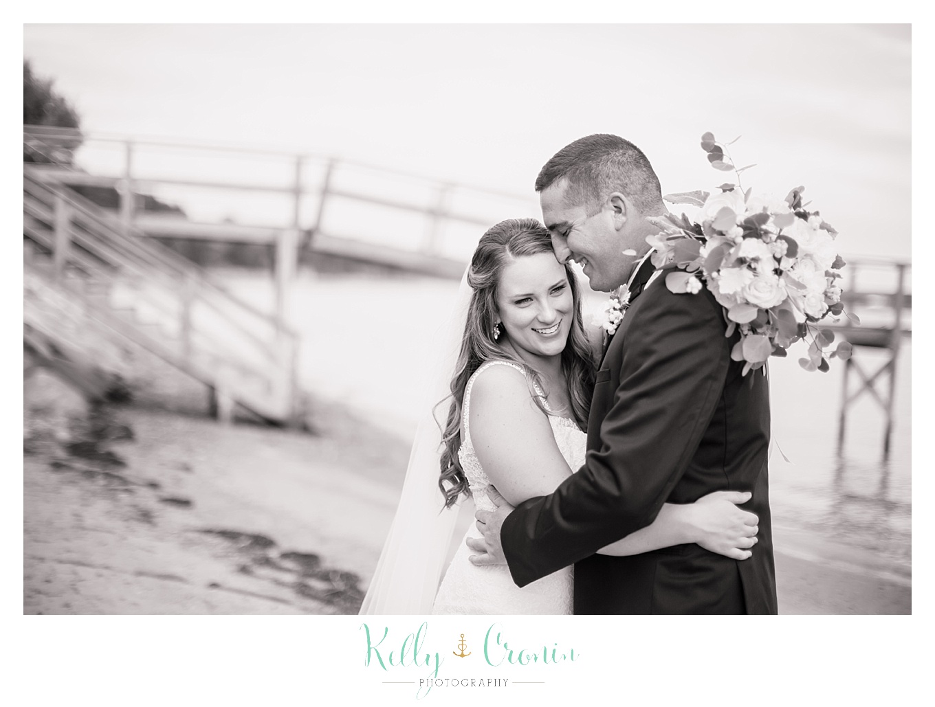 A groom whispers to his bride | Kelly Cronin Photography | Cape Cod Wedding Photographer