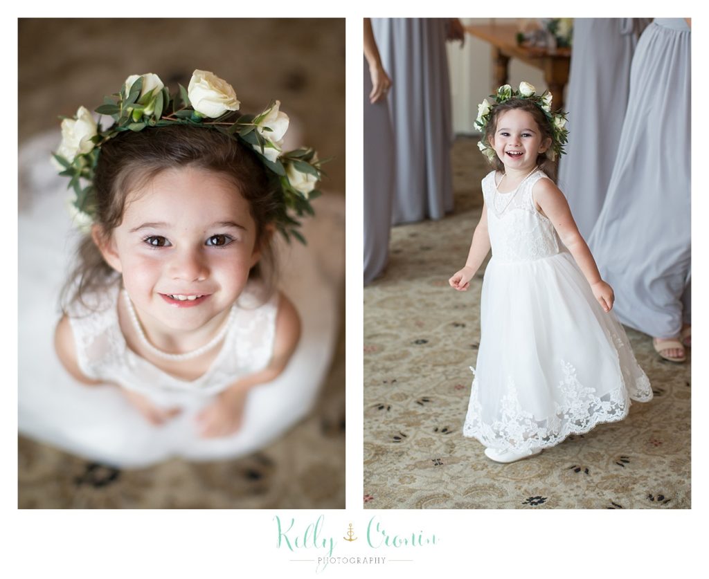 A flower girl spins | Kelly Cronin Photography | Cape Cod Wedding Photographer