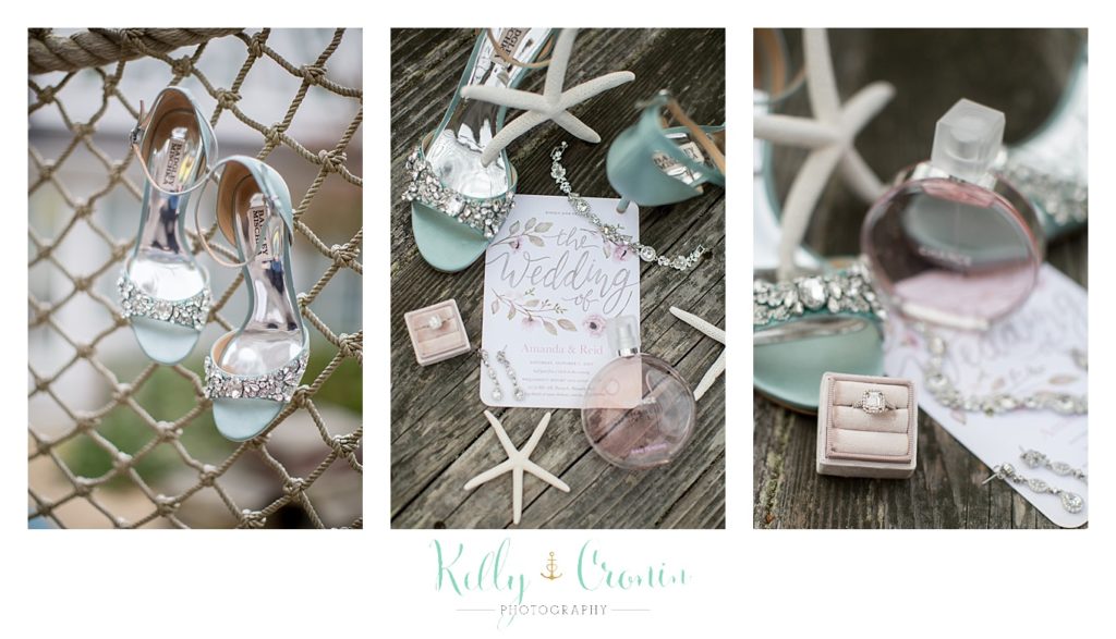 Shells are arranged around an invitation | Kelly Cronin Photography | Cape Cod Wedding Photographer