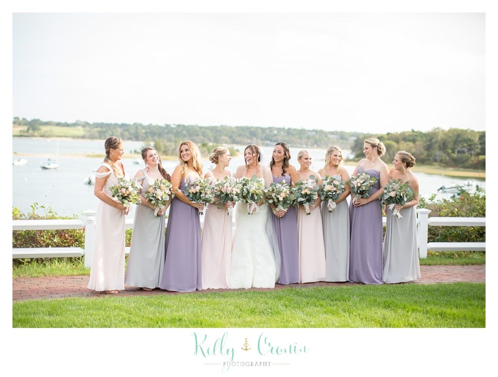 A bridal party stands in front of the ocean | Kelly Cronin Photography | Cape Cod Wedding Photographer