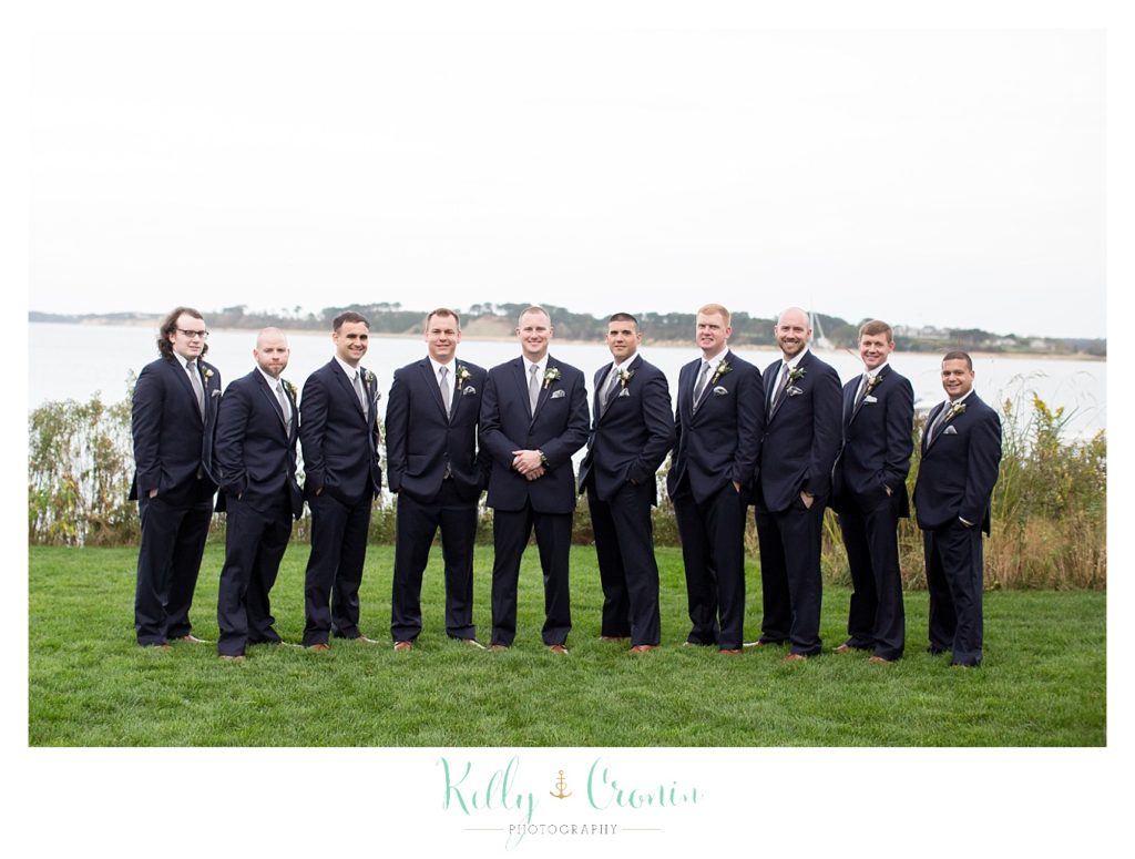 Groomsmen stand confidently | Kelly Cronin Photography | Cape Cod Wedding Photographer