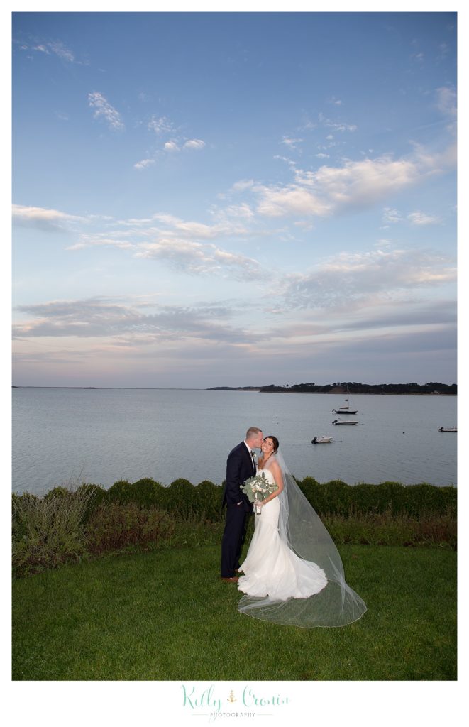 A newlywed couple embrace | Kelly Cronin Photography | Cape Cod Wedding Photographer