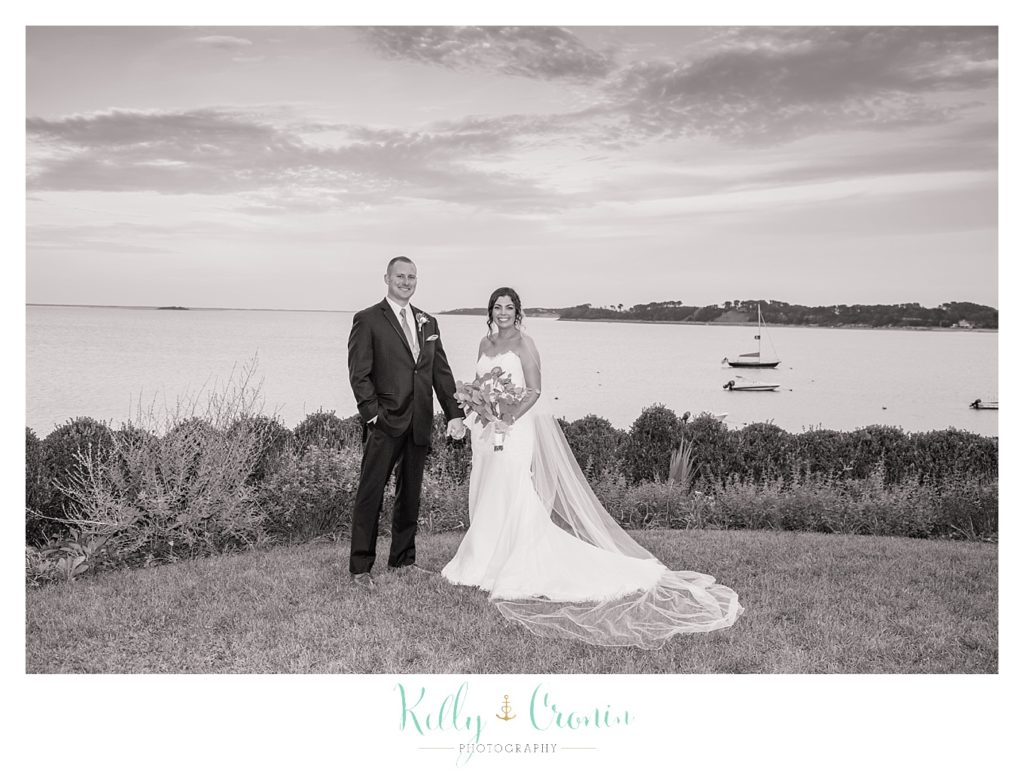A man and his new wife stand together | Kelly Cronin Photography | Cape Cod Wedding Photographer