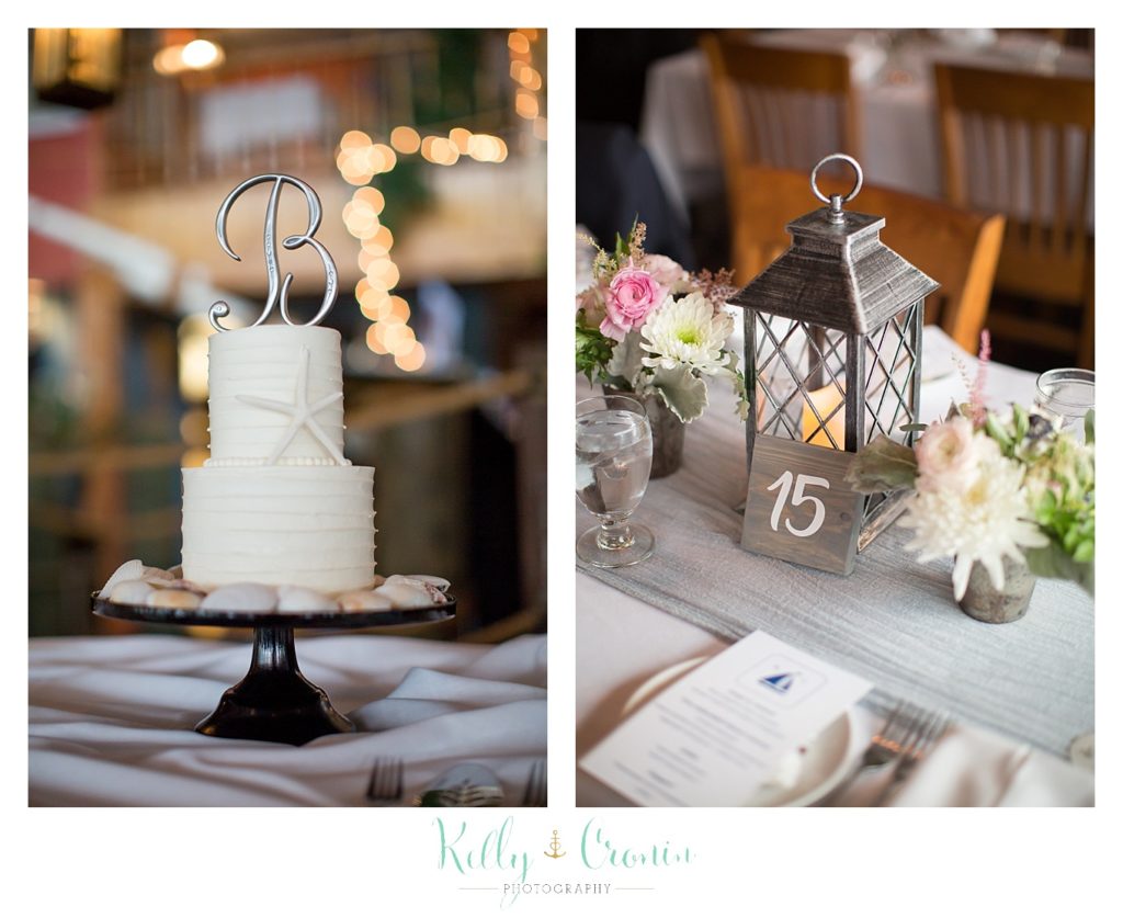 A cake is decorated  | Kelly Cronin Photography | Cape Cod Wedding Photographer