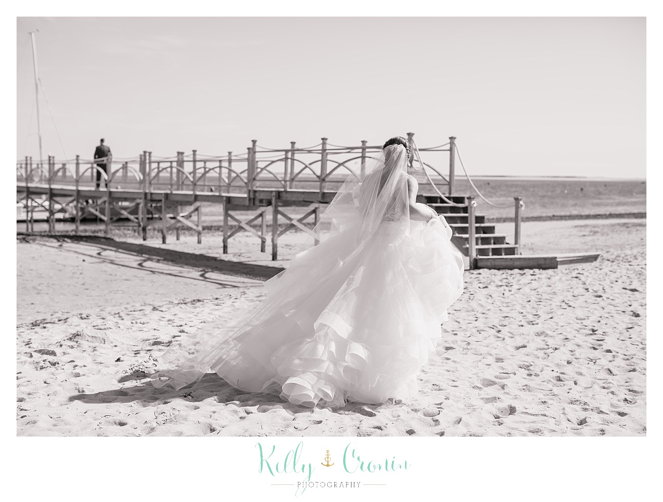 A bride walks in the sand | Kelly Cronin Photography | Cape Cod Wedding Photographer