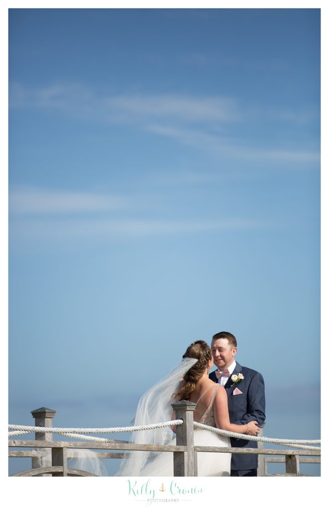 A veil blows in the wind | Kelly Cronin Photography | Cape Cod Wedding Photographer