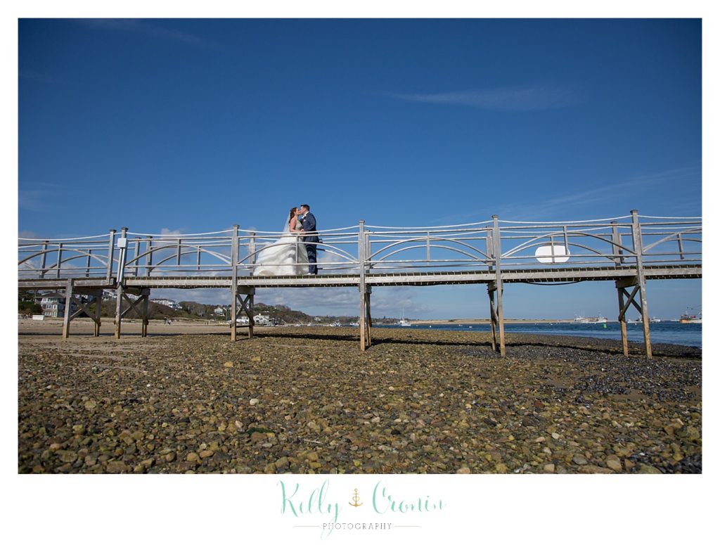 On a pier | Kelly Cronin Photography | Cape Cod Wedding Photographer
