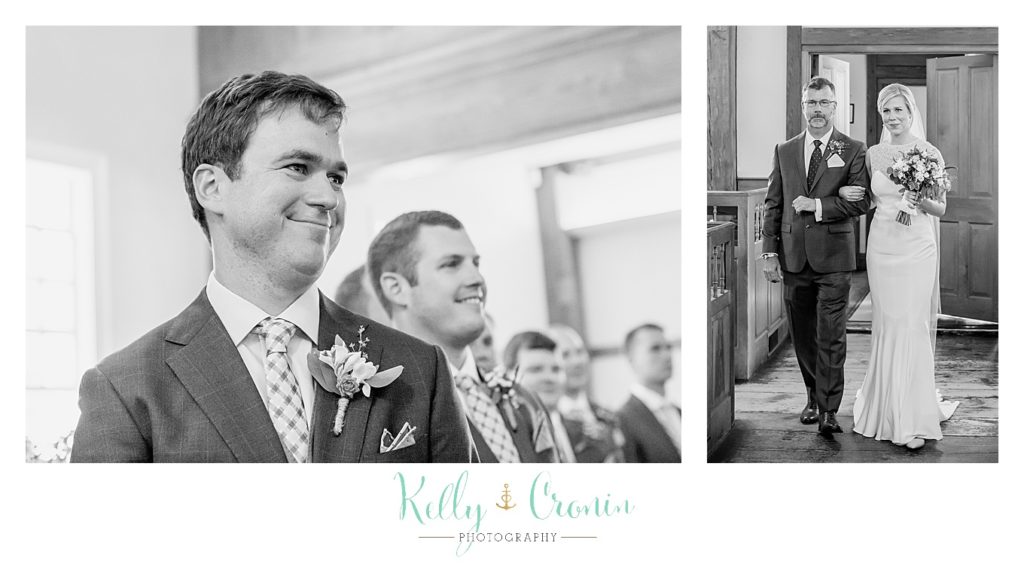 A groom smiles at his bride | Kelly Cronin Photography | Ocean Edge Resort and Golf Club
