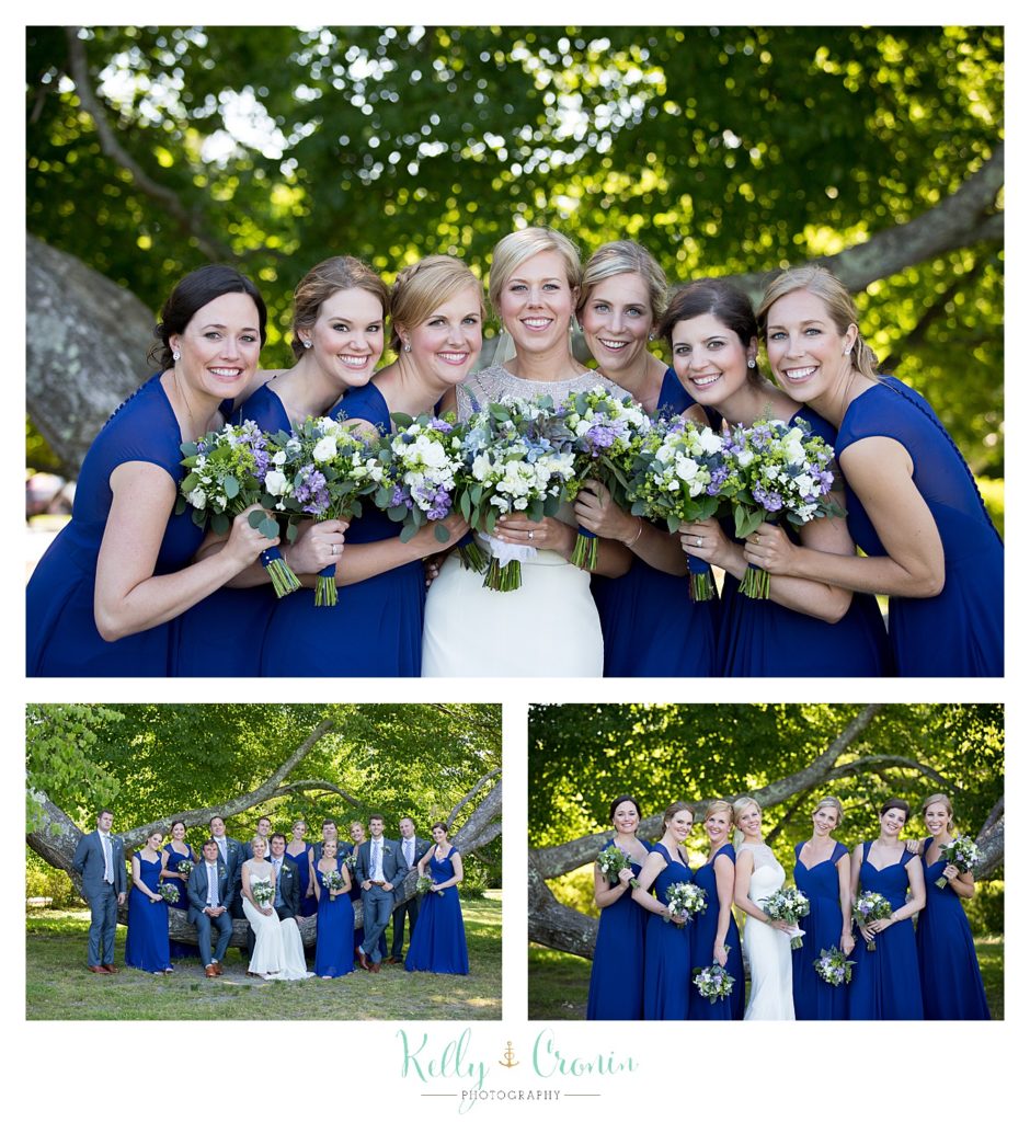 A bride poses with her friends | Kelly Cronin Photography | Ocean Edge Resort and Golf Club