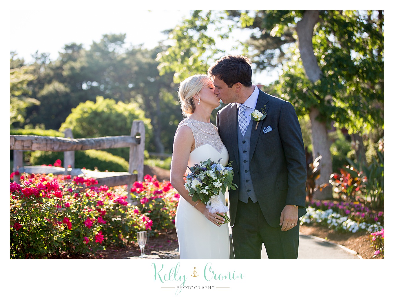 A couple kiss each other | Kelly Cronin Photography | Ocean Edge Resort and Golf Club