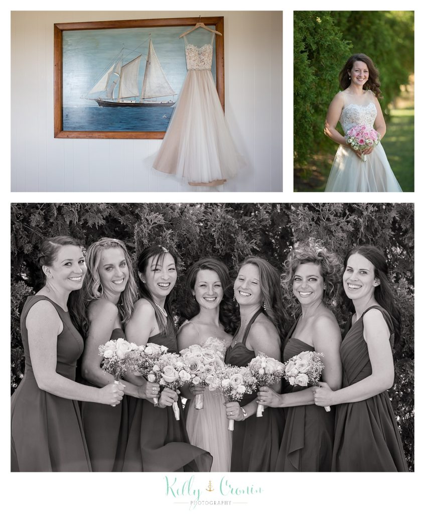 A dress hangs near a sailboat photo | Wedding Photographer in Cape Cod | Kelly Cronin Photography