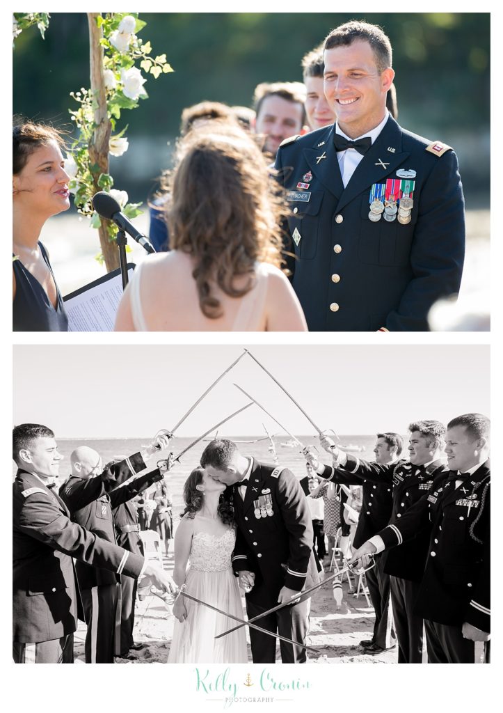 A bride and groom walk through a tunnel | Wedding Photographer in Cape Cod | Kelly Cronin Photography
