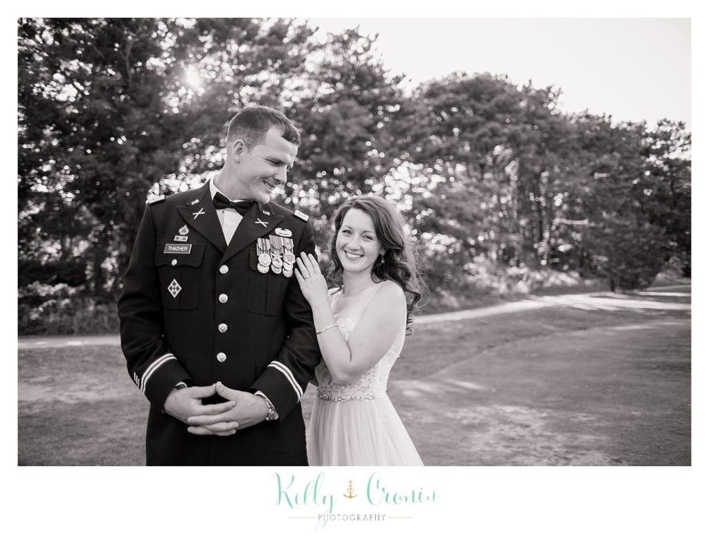 A groom looks at his bride | Wedding Photographer in Cape Cod | Kelly Cronin Photography