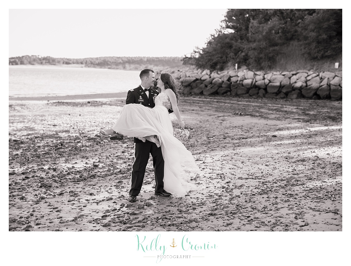 A groom carries his bride | Wedding Photographer in Cape Cod | Kelly Cronin Photography