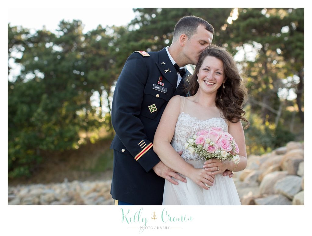 A groom kisses his bride | Wedding Photographer in Cape Cod | Kelly Cronin Photography