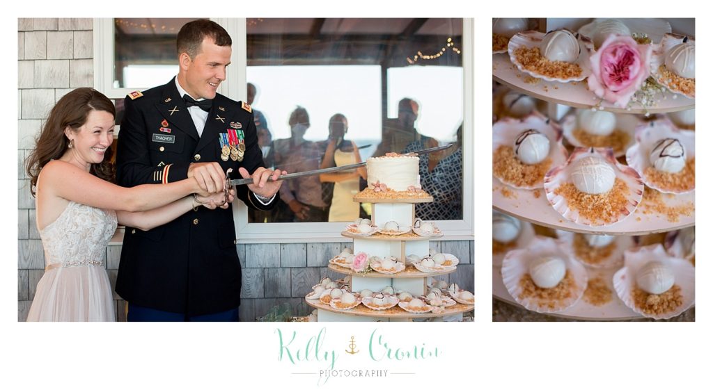 A bride and groom cut their cake | Wedding Photographer in Cape Cod | Kelly Cronin Photography
