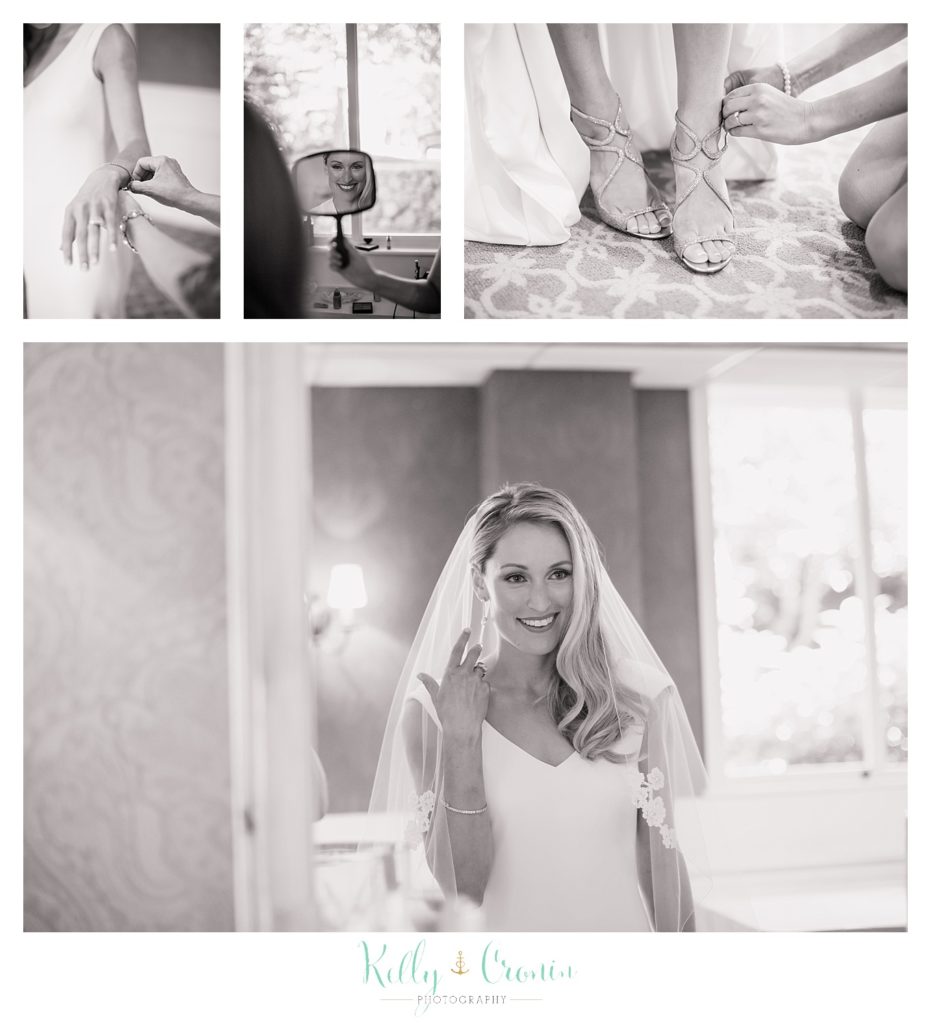 A bride is getting ready for her Romance in Cape Cod. | Captured by Kelly Cronin Photography